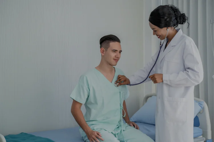 african-american-doctor-is-checking-symptoms-by-checking-patient-s-heart-patient-s-bed-provide-consultation-regarding-treatment-patients-sitting-wheelchair-1